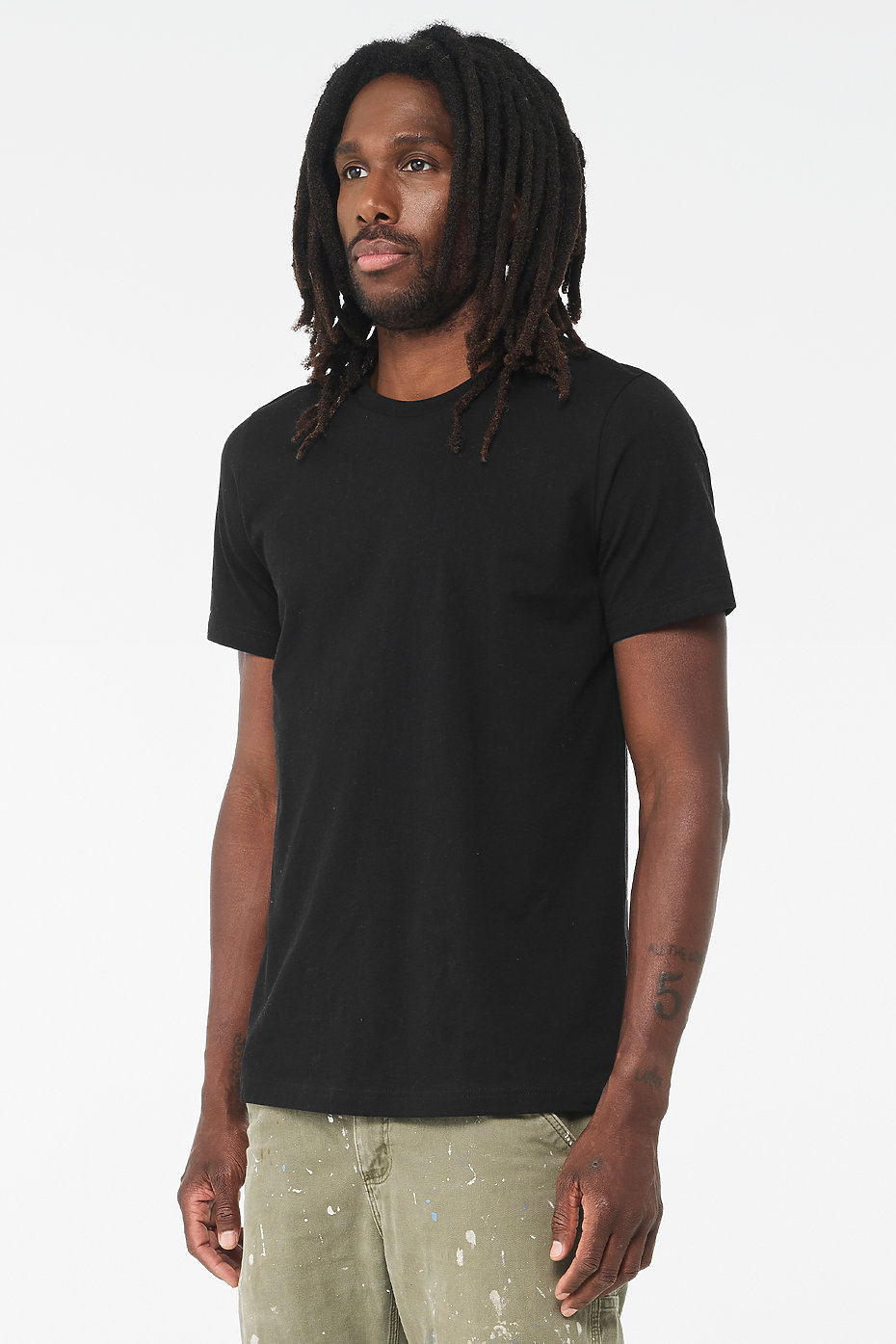 Side view of man wearing black Premium Soft T-shirt 